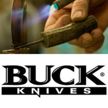 Buck knives logo showing a hand holding a blade while hand tempering with a blowtorch over the words “BUCK KNIVES” on a white background.